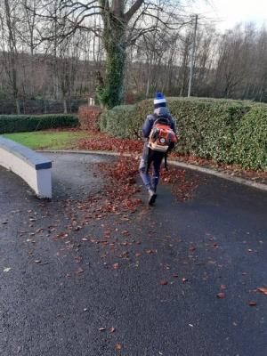 Photo of Mid Ulster Christmas Community Service Clearing up leaves at Coalisland Church of Ireland